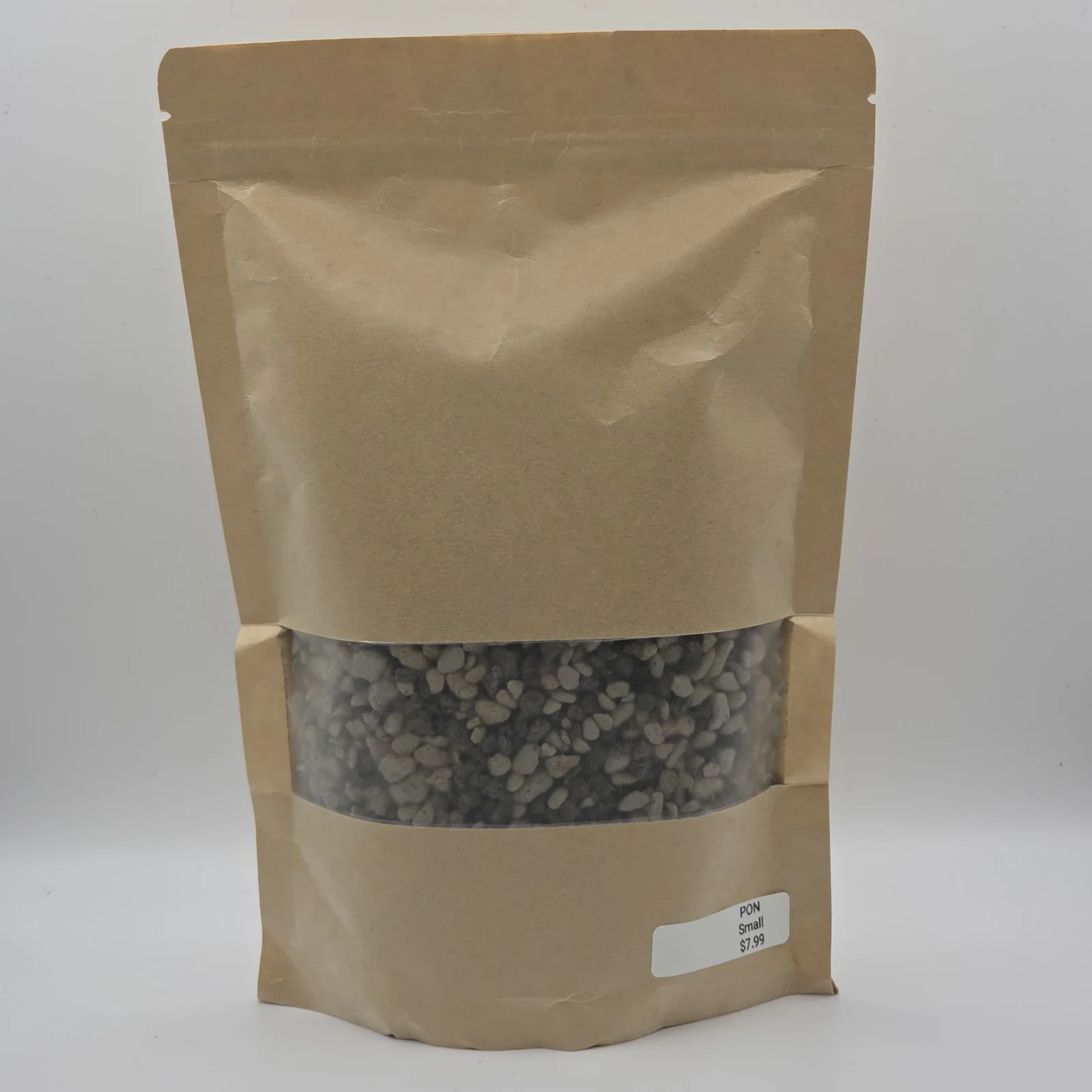 Pon lightweight horticultural substrate in kraft paper pouch with window display.