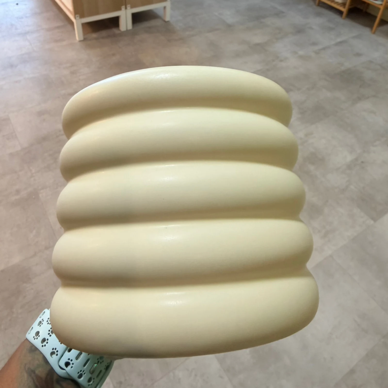 Bubble Pot Cream 5" decorative ceramic planter with ribbed bulbous design held in hand.