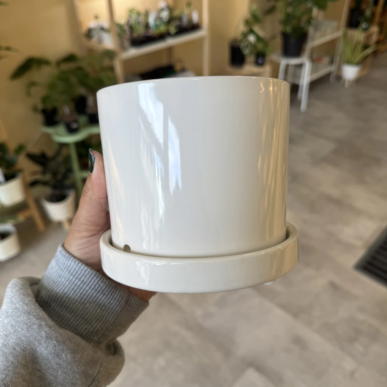 4" Ceramic Pot with Attached Tray, white glazed planter with saucer, held in hand