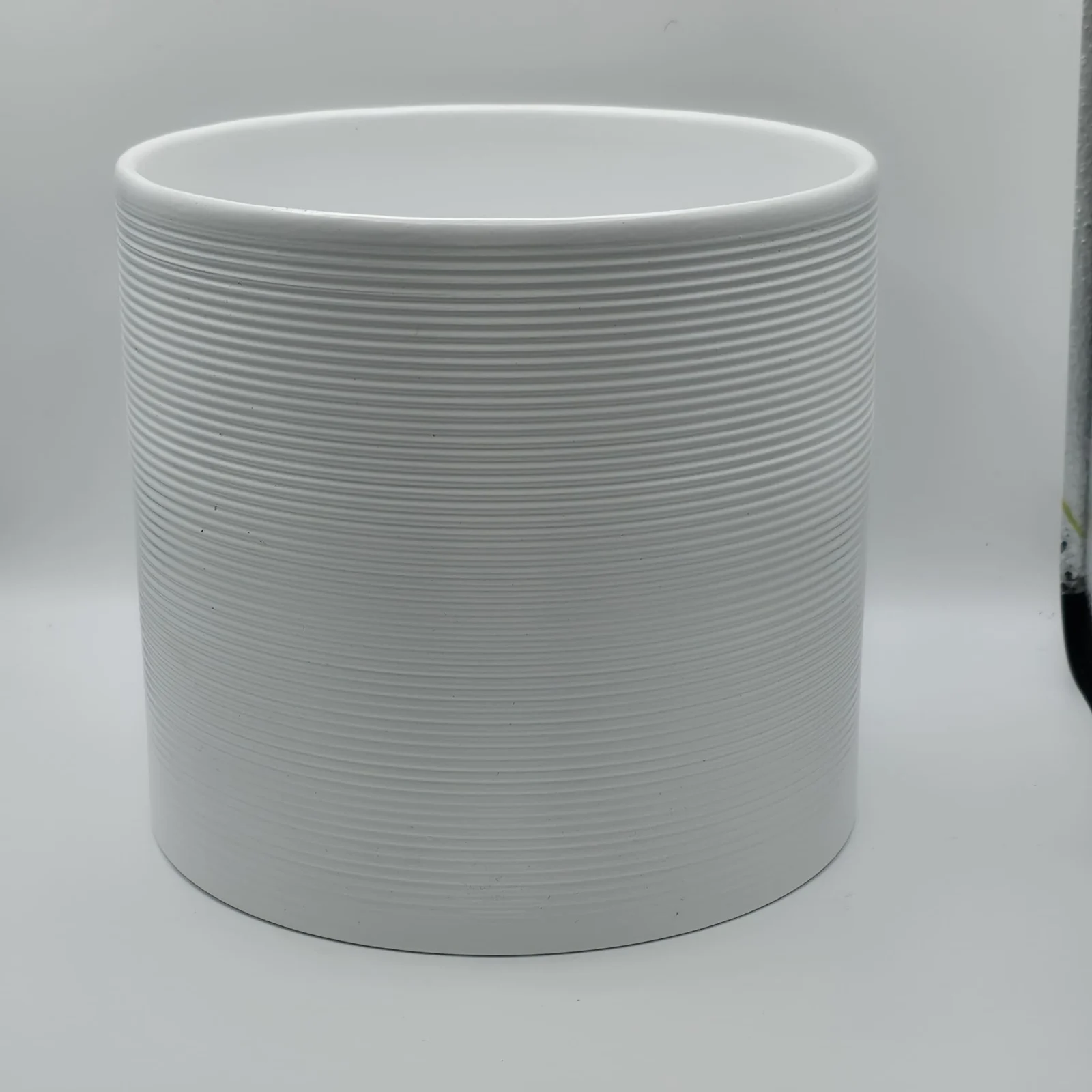 Papaya Pot White 6.5" ceramic planter with textured ridged design for houseplants.
