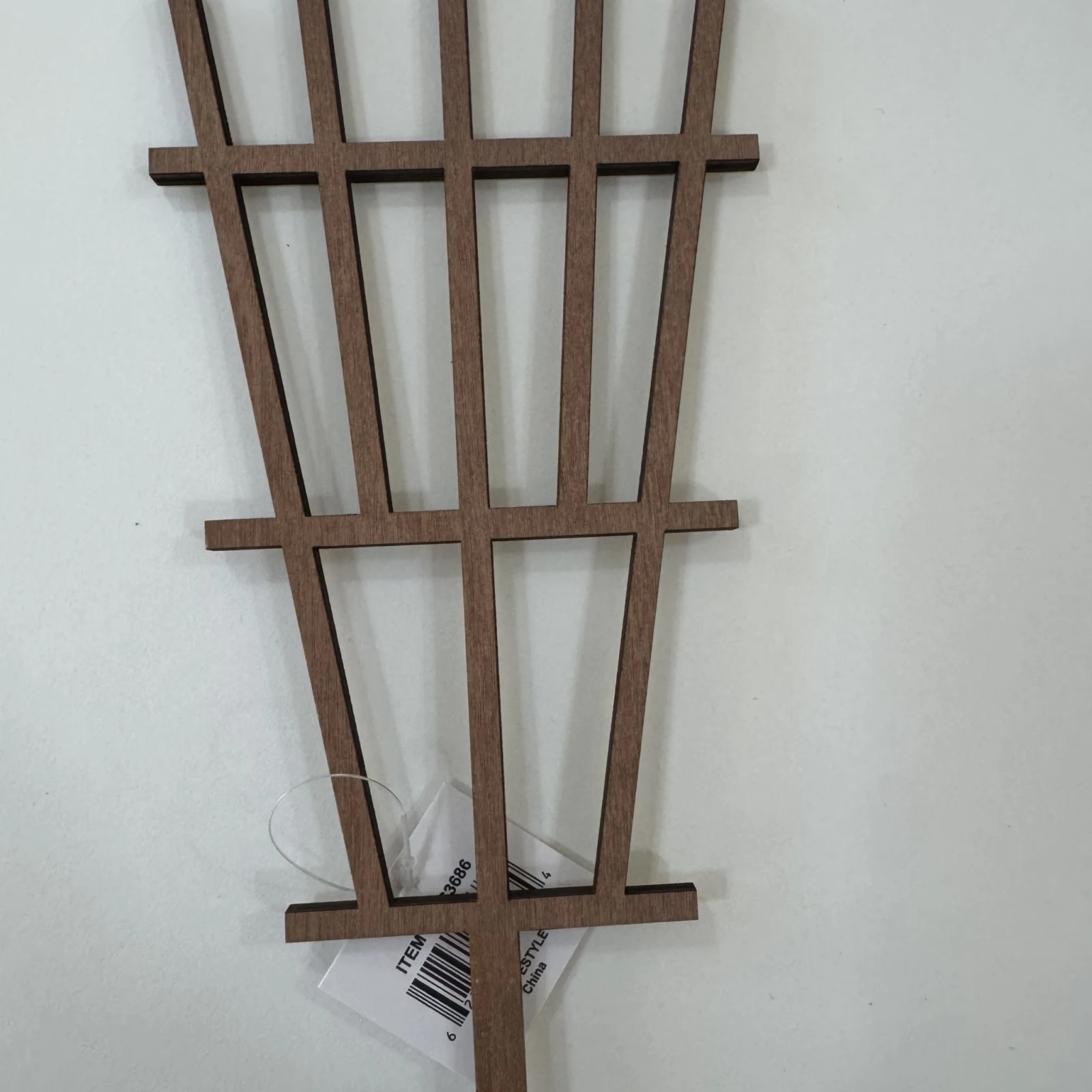 Mini Trellis wooden garden plant support structure with vertical and horizontal slats.