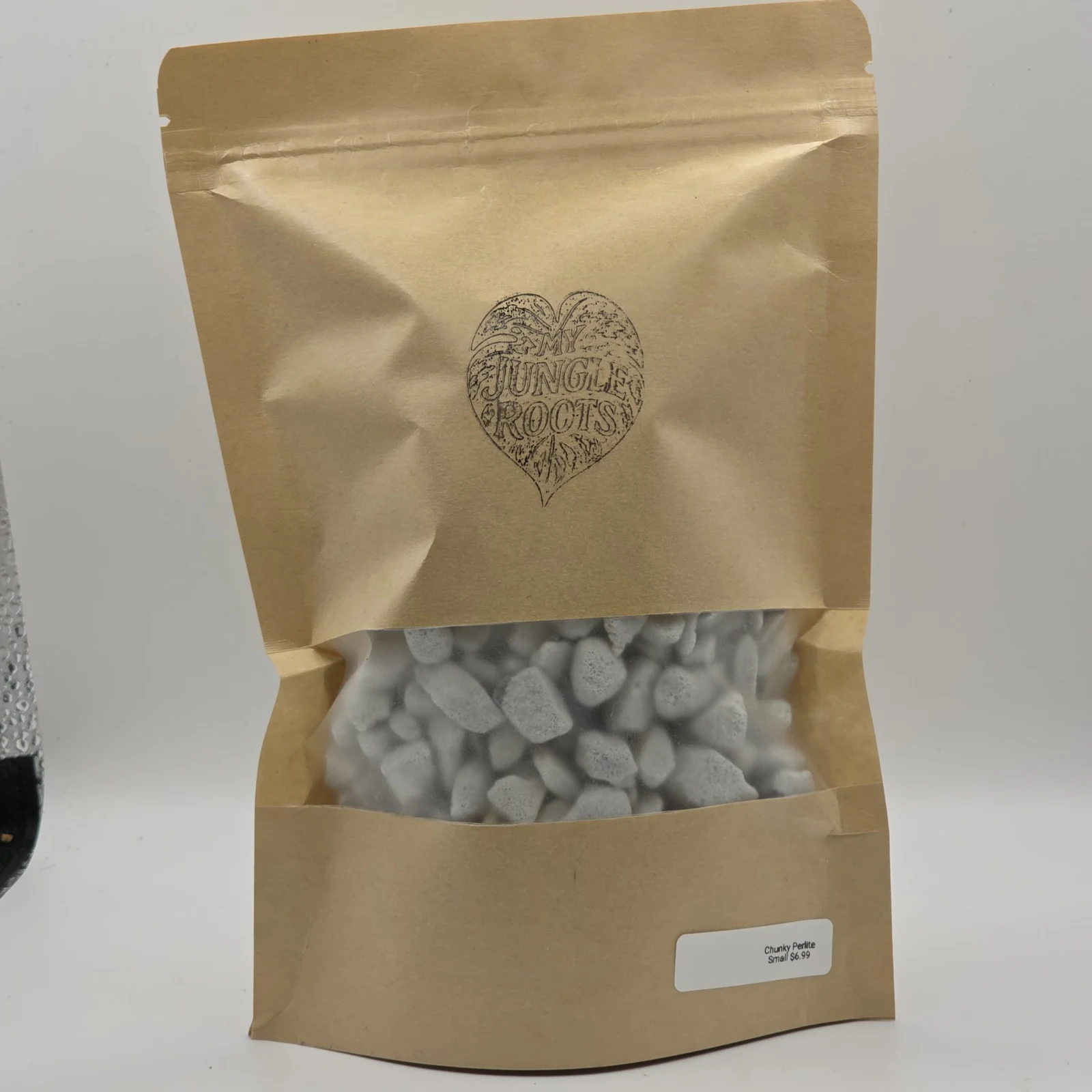Chunky Perlite in kraft paper packaging with heart logo and window display.