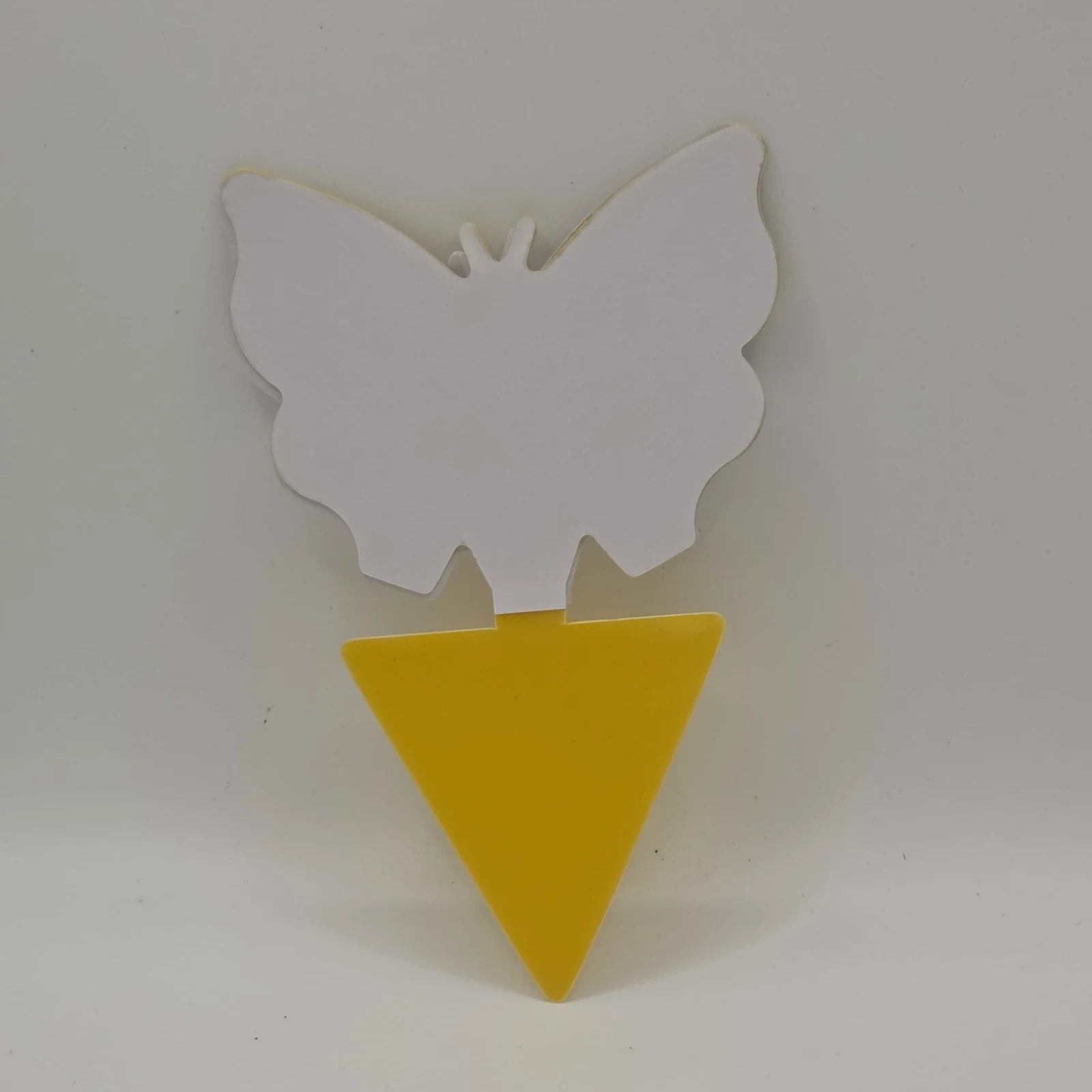 Fungus Gnat Trap with butterfly-shaped white sticky card and yellow triangular base.